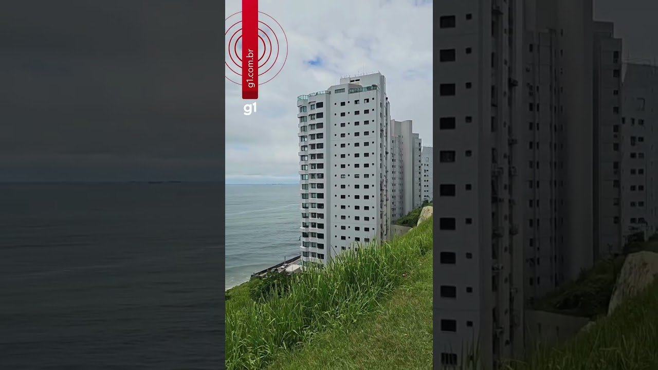 Mulher se arrisca em parapeito limpando janela de prédio no litoral de SP