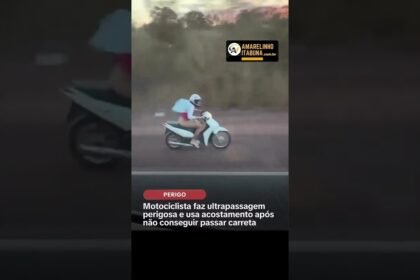 Motociclista é flagrada ultrapassado carreta pelo acostamento na contramão! Motociclista é flagrada ultrapassado carreta pelo acostamento na contramão!